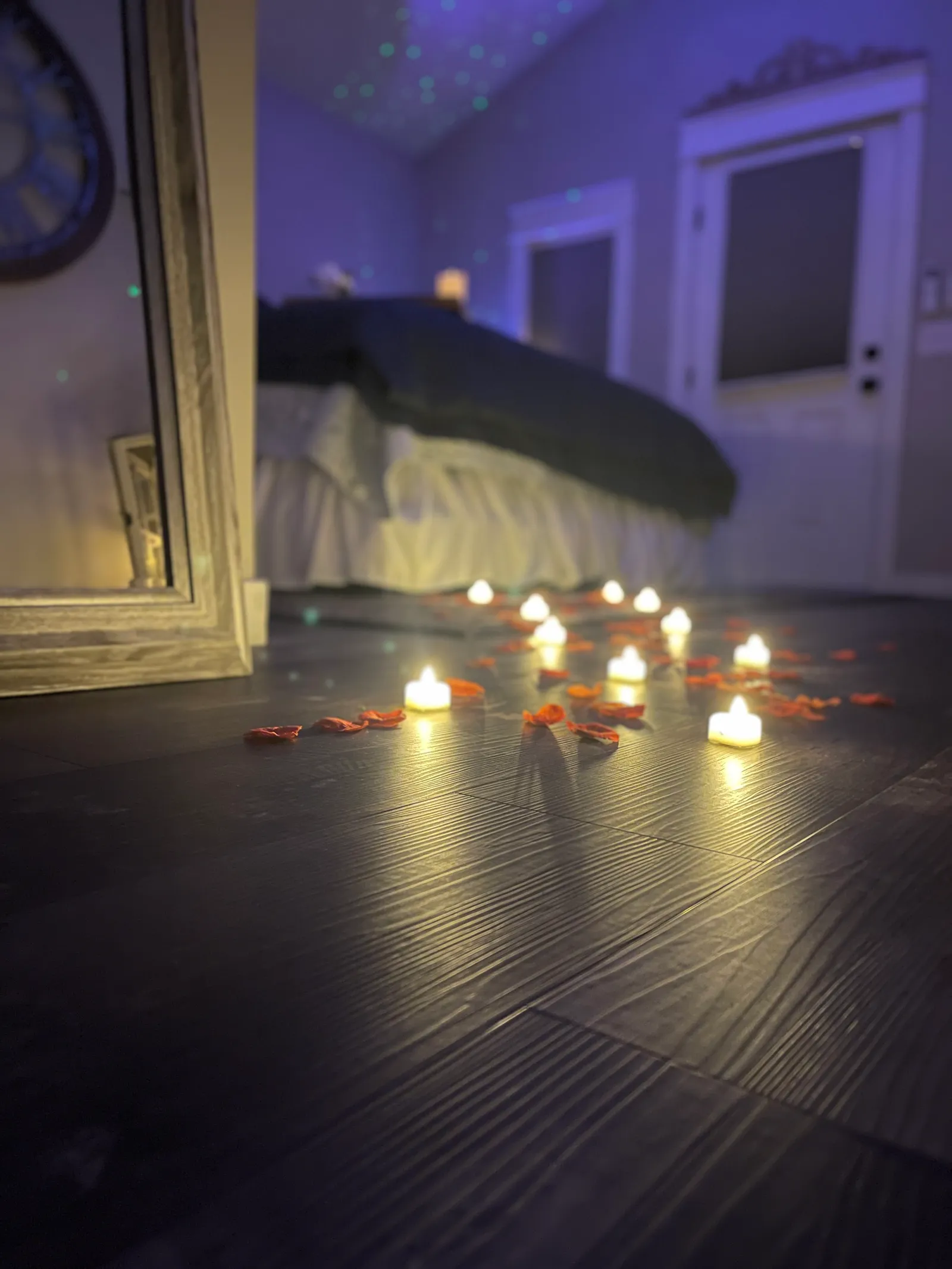 Rose petal trail and floating candles in private hot tub